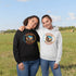 Celebrate the heart of the prairies with our Manitoba – Wild & Free hoodie, featuring a stunning graphic of a Canadian goose soaring over golden wheat fields.